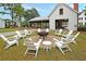 Fire pit area with lots of Adirondack chairs for community gatherings at 331 Weston Hall Dr, Summerville, SC 29483