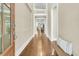 Elegant foyer showcasing hardwood floors, neutral walls, and an open staircase at 331 Weston Hall Dr, Summerville, SC 29483