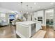 Bright, open concept kitchen with a large island and a view of the living room at 331 Weston Hall Dr, Summerville, SC 29483
