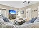 Comfortable living room with neutral decor, large sectional, and a wall-mounted television at 331 Weston Hall Dr, Summerville, SC 29483