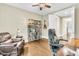 Comfortable office space with hardwood floors, a ceiling fan, and a leather recliner at 331 Weston Hall Dr, Summerville, SC 29483