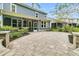 Beautiful outdoor stone patio with lush greenery, perfect for outdoor entertaining and relaxation at 331 Weston Hall Dr, Summerville, SC 29483