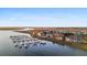 Beautiful aerial view of waterfront condos, marina and waterfront, on a clear day at 46 Mariners Cay Dr, Folly Beach, SC 29439