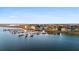 Scenic aerial shot of a waterfront real estate and marina at 46 Mariners Cay Dr, Folly Beach, SC 29439