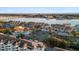Overhead view of the condo community featuring amenities like tennis courts and a sparkling pool at 46 Mariners Cay Dr, Folly Beach, SC 29439
