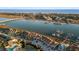 Aerial view of the real estate featuring a bridge and beautiful marsh views at 46 Mariners Cay Dr, Folly Beach, SC 29439
