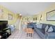 Inviting living room with cozy seating and a view into the dining area at 46 Mariners Cay Dr, Folly Beach, SC 29439