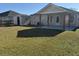 Large backyard featuring a storage shed and covered patio at 5082 Westview St, North Charleston, SC 29418