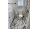 Clean bathroom with white marble floor and shower at 5082 Westview St, North Charleston, SC 29418