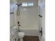 Bathroom features a tub with shower, granite countertop, and modern black hardware at 5082 Westview St, North Charleston, SC 29418