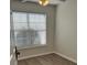 Bedroom featuring wood flooring and a window with blinds at 5082 Westview St, North Charleston, SC 29418