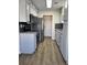 Kitchen boasts granite countertops, stainless steel appliances, and ample cabinet space for storage and organization at 5082 Westview St, North Charleston, SC 29418