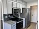 Kitchen featuring granite countertops, stainless steel appliances and abundant cabinet space for efficient storage at 5082 Westview St, North Charleston, SC 29418