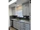 Updated kitchen featuring granite countertops, stainless steel appliances and ample cabinet space for storage and organization at 5082 Westview St, North Charleston, SC 29418