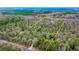 Aerial shot of a vast property marked with yellow line in a dense, wooded setting at 5585 Wire Road, Branchville, SC 29432