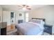 Comfortable bedroom with wood-look floors and ensuite bathroom at 700 Daniel Ellis Dr # 13302, Charleston, SC 29412