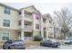 Three-story apartment building with multiple balconies and reserved parking for tenants at 700 Daniel Ellis Dr # 13302, Charleston, SC 29412