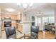 Bright living room is connected to an eat-in kitchen, fireplace and hardwood floors at 700 Daniel Ellis Dr # 13302, Charleston, SC 29412