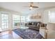 Open concept living area with couch, outdoor access, and lots of natural light at 700 Daniel Ellis Dr # 13302, Charleston, SC 29412