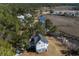 Gorgeous aerial shot showcasing the property's location near winding river and marshland at 7527 Ladys Secret Ln, Awendaw, SC 29429