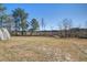 Large backyard with wood bridge and access to marsh at 7527 Ladys Secret Ln, Awendaw, SC 29429