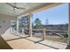 Spacious covered porch offers a relaxing outdoor living space with waterfront view at 7527 Ladys Secret Ln, Awendaw, SC 29429