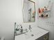 Elegant bathroom features a sleek vanity with stylish mirror and decor, creating a serene and functional space at 78 Nassau St, Charleston, SC 29403