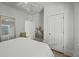 Clean bedroom features a plush bed, modern decor, and ample natural light at 78 Nassau St, Charleston, SC 29403