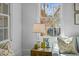 Bright living room features natural light from large window, complemented by stylish decor for cozy atmosphere at 78 Nassau St, Charleston, SC 29403