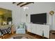 Stylish living room with modern furniture, decor, and a large television at 78 Nassau St, Charleston, SC 29403