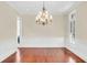 Formal dining room with a decorative chandelier and wainscoting at 87 Dungannon Hall, Kiawah Island, SC 29455