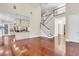 Spacious living room with a grand staircase, kitchen access and lots of light at 87 Dungannon Hall, Kiawah Island, SC 29455