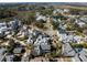 Stunning aerial view of a tree-lined neighborhood featuring beautifully designed homes and well-maintained streets at 914 Tupelo Bay Dr, Mount Pleasant, SC 29464