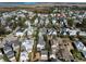 Expansive aerial view of a charming neighborhood with lush landscaping and diverse architectural styles near the coast at 914 Tupelo Bay Dr, Mount Pleasant, SC 29464