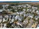 Aerial view of a neighborhood featuring blue homes and waterfront in the distance at 914 Tupelo Bay Dr, Mount Pleasant, SC 29464