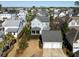 Aerial view of the property featuring a landscaped backyard and a two-car detached garage at 914 Tupelo Bay Dr, Mount Pleasant, SC 29464