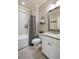 Well-lit bathroom with tub and shower combo, white cabinets, and granite countertop at 914 Tupelo Bay Dr, Mount Pleasant, SC 29464