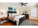 Comfortable bedroom with a cozy bed, wooden floors, and modern decor at 914 Tupelo Bay Dr, Mount Pleasant, SC 29464