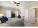 Comfortable bedroom with a cozy bed, wooden floors, and bright natural light at 914 Tupelo Bay Dr, Mount Pleasant, SC 29464