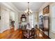 Traditional dining room with hardwood floors, chandelier, and elegant décor at 914 Tupelo Bay Dr, Mount Pleasant, SC 29464