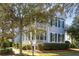 Charming two-story home boasts manicured landscaping, classic shutters, and inviting front porch at 914 Tupelo Bay Dr, Mount Pleasant, SC 29464