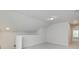 Neutral bonus room with carpeted floor, sloped ceilings, and ample natural light at 1012 Swamp Rose Run, Summerville, SC 29485