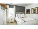 Contemporary bedroom with neutral color palette, providing a serene and inviting retreat, complimented by soft, natural light at 1016 Swamp Rose Run, Summerville, SC 29485