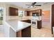 Bright kitchen with wooden cabinets, white appliances, and functional layout at 1051 Wayfarer Ln, Charleston, SC 29412