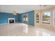 Living room with tile floors, fireplace, and sliding glass doors at 1051 Wayfarer Ln, Charleston, SC 29412