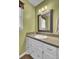 Bright bathroom with a large mirror, neutral vanity, and plenty of natural light at 108 Gambels Ln, Summerville, SC 29485