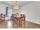 Dining area featuring a wooden table set with charming chandelier lighting at 108 Gambels Ln, Summerville, SC 29485