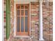 Close up of a stylish front door with decorative windows and sidelights at 108 Gambels Ln, Summerville, SC 29485