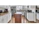 Well lit kitchen featuring white cabinets and stainless steel appliances at 108 Gambels Ln, Summerville, SC 29485