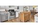 Bright kitchen with stainless steel dishwasher and oven and wood floors at 108 Gambels Ln, Summerville, SC 29485